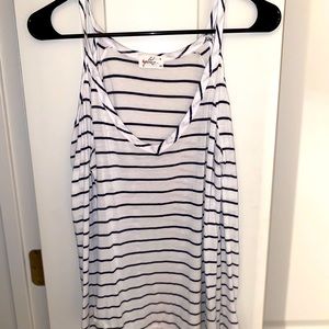 Striped long sleeve with cut our shoulders.